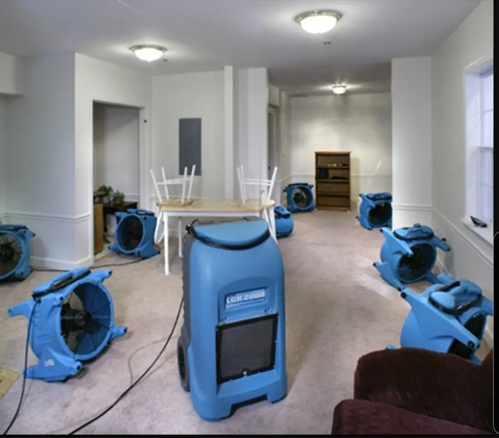 Air movers and dehumidifier setup for Water Damage Restoration in Courtland